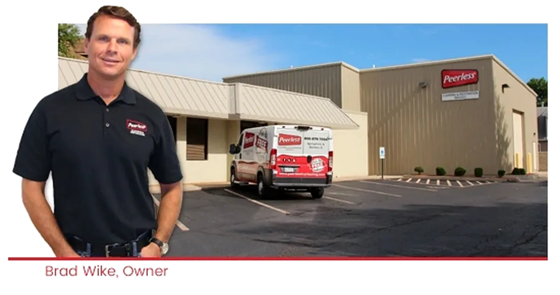 Brad Wike, owner of Peerless, pictured with the company building and service van